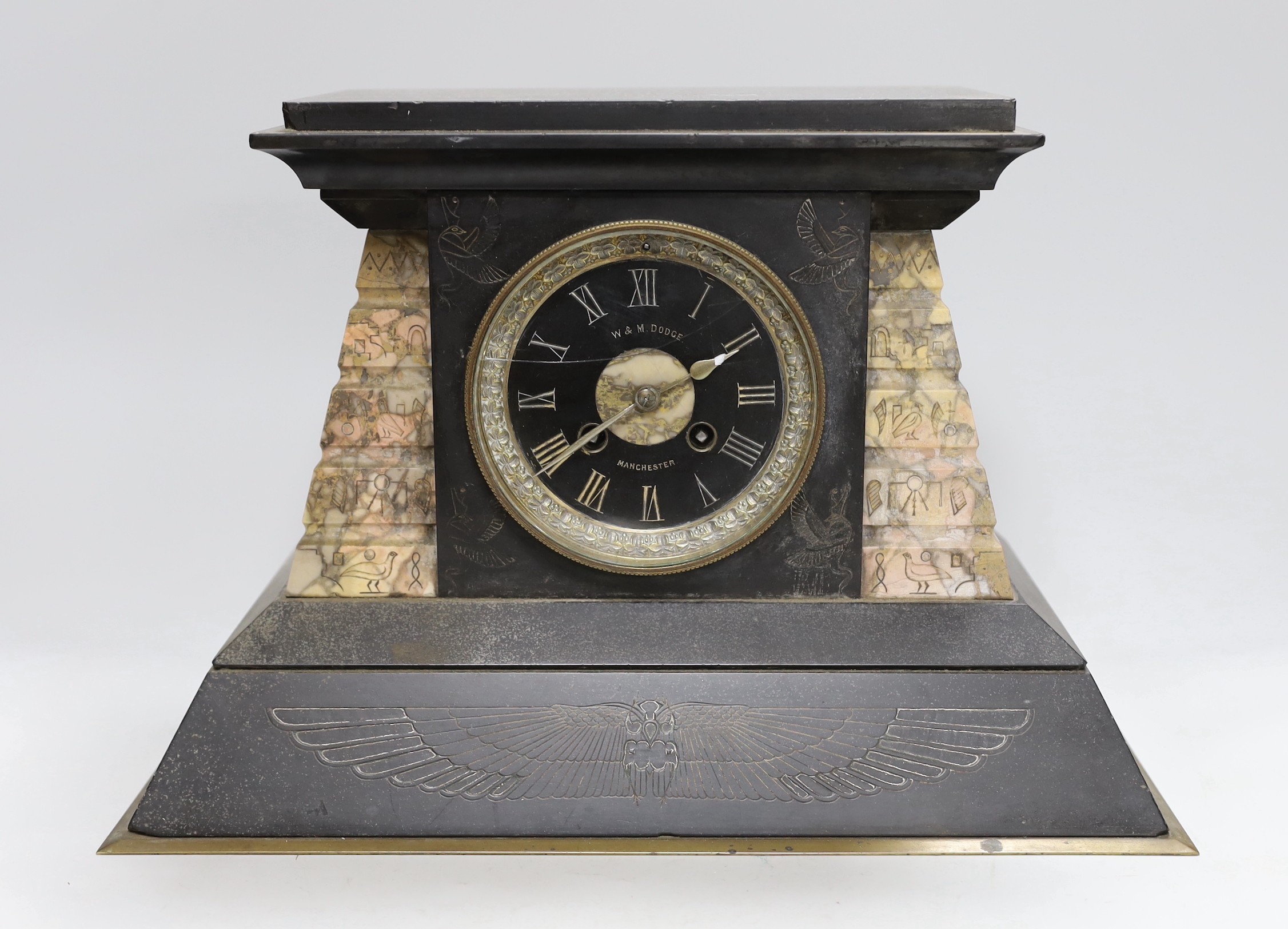 A W & M Dodge black slate and rose marble mantel clock with Egyptian engraved hieroglyphs, 25cm high